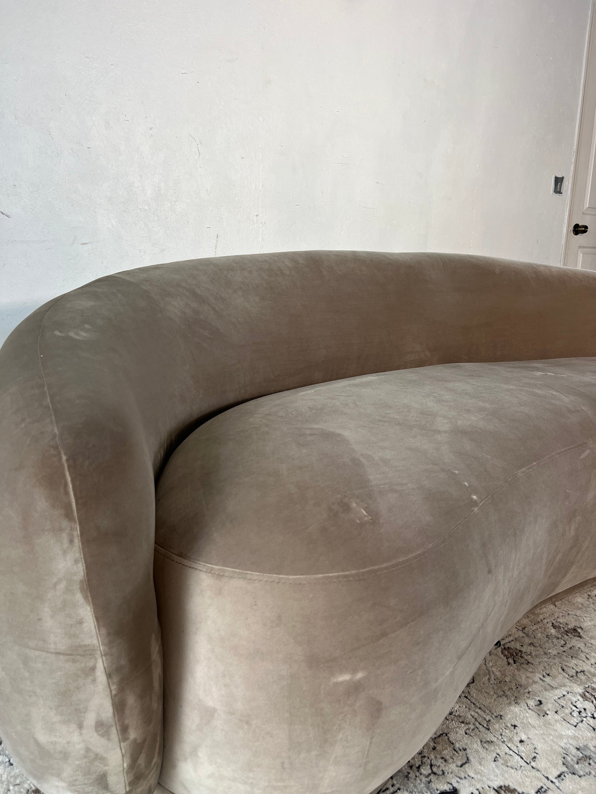 Meridan Furniture “Emery” Beige Curved Sofa