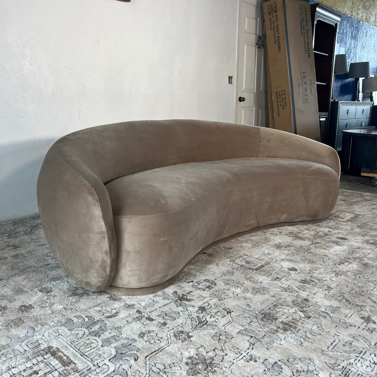 Meridan Furniture “Emery” Beige Curved Sofa